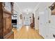 Elegant entryway with hardwood floors, decorative lighting, and classic furnishings at 138 Copper Leaf Dr., Myrtle Beach, SC 29588