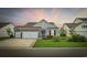 Charming single-story home featuring brick accents, manicured lawn, and a two-car garage at 138 Copper Leaf Dr., Myrtle Beach, SC 29588