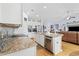 Bright kitchen with stainless appliances, granite countertops, and an island with seating at 138 Copper Leaf Dr., Myrtle Beach, SC 29588