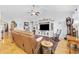 Inviting living room featuring hardwood floors, a media center, and comfortable seating at 138 Copper Leaf Dr., Myrtle Beach, SC 29588