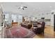 Living room with hardwood floors, leather furniture, and a decorative rug at 138 Copper Leaf Dr., Myrtle Beach, SC 29588
