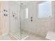 Walk-in shower with glass surround, neutral tiles, and a built-in shower niche at 138 Copper Leaf Dr., Myrtle Beach, SC 29588