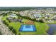 Community aerial view of tennis courts, pond, and clubhouse and neighborhood at 138 Copper Leaf Dr., Myrtle Beach, SC 29588