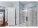 Bright bathroom features a glass enclosed shower and white trim at 156 Parmelee Dr. # D, Murrells Inlet, SC 29576