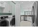 Bright kitchen featuring white cabinets, stainless steel appliances, and granite countertops at 156 Parmelee Dr. # D, Murrells Inlet, SC 29576