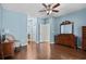 Spacious main bedroom featuring hardwood floors and a ceiling fan at 156 Parmelee Dr. # D, Murrells Inlet, SC 29576