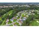Bird's-eye view of the neighborhood including the golf course and well-maintained homes at 161 Barclay Dr., Myrtle Beach, SC 29579