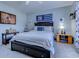 Inviting bedroom featuring a comfortable bed, carpeted floor, and blue accent decorations at 161 Barclay Dr., Myrtle Beach, SC 29579