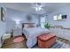 Bright bedroom with a ceiling fan, stylish furniture, and a mounted television at 161 Barclay Dr., Myrtle Beach, SC 29579