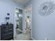 Charming hallway with a decorative mirror leading to the bathroom and bedroom at 161 Barclay Dr., Myrtle Beach, SC 29579