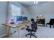 Functional office space with a spacious desk, comfortable chair, and natural light at 161 Barclay Dr., Myrtle Beach, SC 29579
