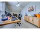 Bright office with a ceiling fan, large desk, and storage cabinets at 161 Barclay Dr., Myrtle Beach, SC 29579