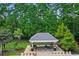 Aerial view of a shaded picnic area near lounge area with lush green surroundings at 161 Barclay Dr., Myrtle Beach, SC 29579