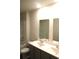 Bathroom features dual sinks, mirrors, and a shower-tub combination at 161 Londonshire Dr., Myrtle Beach, SC 29579