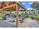 Covered patio area with multiple seating areas at 1619 Deer Park Ln., Surfside Beach, SC 29575