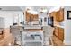 Kitchen featuring breakfast bar, tiled floors, and light oak cabinets at 1619 Deer Park Ln., Surfside Beach, SC 29575