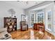 Cozy living room featuring hardwood floors, natural light, and a comfortable seating area at 1619 Deer Park Ln., Surfside Beach, SC 29575