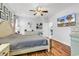 Bedroom featuring light gray walls and hardwood floors at 1619 Deer Park Ln., Surfside Beach, SC 29575
