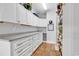 Walk-in pantry with ample shelving and storage space, perfect for organization and convenience at 1619 Deer Park Ln., Surfside Beach, SC 29575