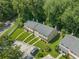 Aerial view of townhomes with lush green spaces at 178 Beaver Pond Loop # 60, Pawleys Island, SC 29585