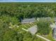 Aerial view of townhomes with lush green surroundings at 178 Beaver Pond Loop # 60, Pawleys Island, SC 29585