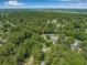 Charming aerial view of townhomes situated near lush trees and surrounding neighborhood, providing a serene environment at 178 Beaver Pond Loop # 60, Pawleys Island, SC 29585
