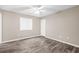 Bright bedroom with wood-look flooring, a window for natural light, and a closet for storage at 178 Beaver Pond Loop # 60, Pawleys Island, SC 29585