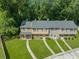 Charming townhome with well-maintained exteriors, lush lawns and manicured walkways at 178 Beaver Pond Loop # 60, Pawleys Island, SC 29585