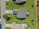 Aerial view showcasing the home's roof, lawn, driveway, and neighborhood at 219 Blackpepper Loop, Little River, SC 29566