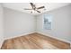 Bare bedroom with wood-look flooring and bright window at 219 Blackpepper Loop, Little River, SC 29566