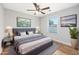 Beautiful bedroom with ceiling fan, gray accents, and decor at 219 Blackpepper Loop, Little River, SC 29566