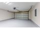 Clean, spacious two car garage with epoxy flooring and automatic door opener at 219 Blackpepper Loop, Little River, SC 29566