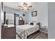 Comfortable bedroom with ceiling fan and decor at 227 Palm Terrace Loop, Conway, SC 29526