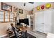 Home office featuring a workspace, dual monitors, ergonomic chair, and custom wall displays at 227 Palm Terrace Loop, Conway, SC 29526