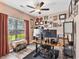Dedicated home office with natural light, modern desk setup, and custom wall decor at 227 Palm Terrace Loop, Conway, SC 29526