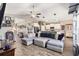 Expansive living room blending seamlessly with the kitchen and dining areas, featuring stylish decor at 227 Palm Terrace Loop, Conway, SC 29526