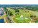 Aerial view showcasing the lush golf course and surrounding community by the ocean at 2273 Hazel Way, Longs, SC 29568
