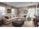 Cozy living room with comfortable seating, ample natural light, and stylish decor, creating a welcoming atmosphere at 2273 Hazel Way, Longs, SC 29568