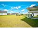 Large grassy backyard, perfect for outdoor activities at 2325 Copper Creek Loop, Longs, SC 29568
