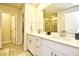 Elegant bathroom with double sink vanity, large mirror, and tiled shower at 2325 Copper Creek Loop, Longs, SC 29568