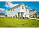 Charming two-story home with manicured front lawn at 2325 Copper Creek Loop, Longs, SC 29568