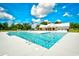 Stunning community pool with a clubhouse in the background at 2325 Copper Creek Loop, Longs, SC 29568