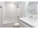 All white bathroom features a shower-tub combo and modern fixtures at 2599 Woodcreek Ln., Conway, SC 29527