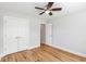 Bedroom features wood flooring, a ceiling fan, and closet at 2599 Woodcreek Ln., Conway, SC 29527