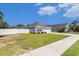 Charming single-story home with a well-manicured lawn and attached garage at 2599 Woodcreek Ln., Conway, SC 29527