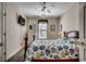 Lovely bedroom with bed, ceiling fan, tv, window with blinds and decorative wall art at 2602 Clearwater St., Myrtle Beach, SC 29579
