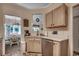 Functional kitchen with stainless appliances, light wood cabinets, and an efficient use of space at 2602 Clearwater St., Myrtle Beach, SC 29579