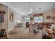 Spacious living room featuring a comfortable seating arrangement, ceiling fan, and neutral color palette at 2602 Clearwater St., Myrtle Beach, SC 29579