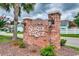 Community welcome sign in brick with decorative lighting and native foliage at 2602 Clearwater St., Myrtle Beach, SC 29579