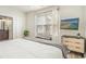 Bedroom featuring a large window, flat-screen tv and white ceiling fan at 2701 Kashton Dr., Myrtle Beach, SC 29577